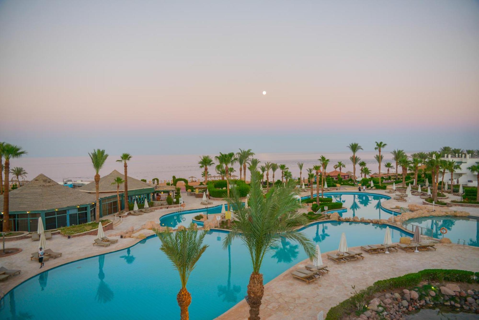 Safir Sharm Waterfalls Resort Exterior photo Sunrise over the Dead Sea