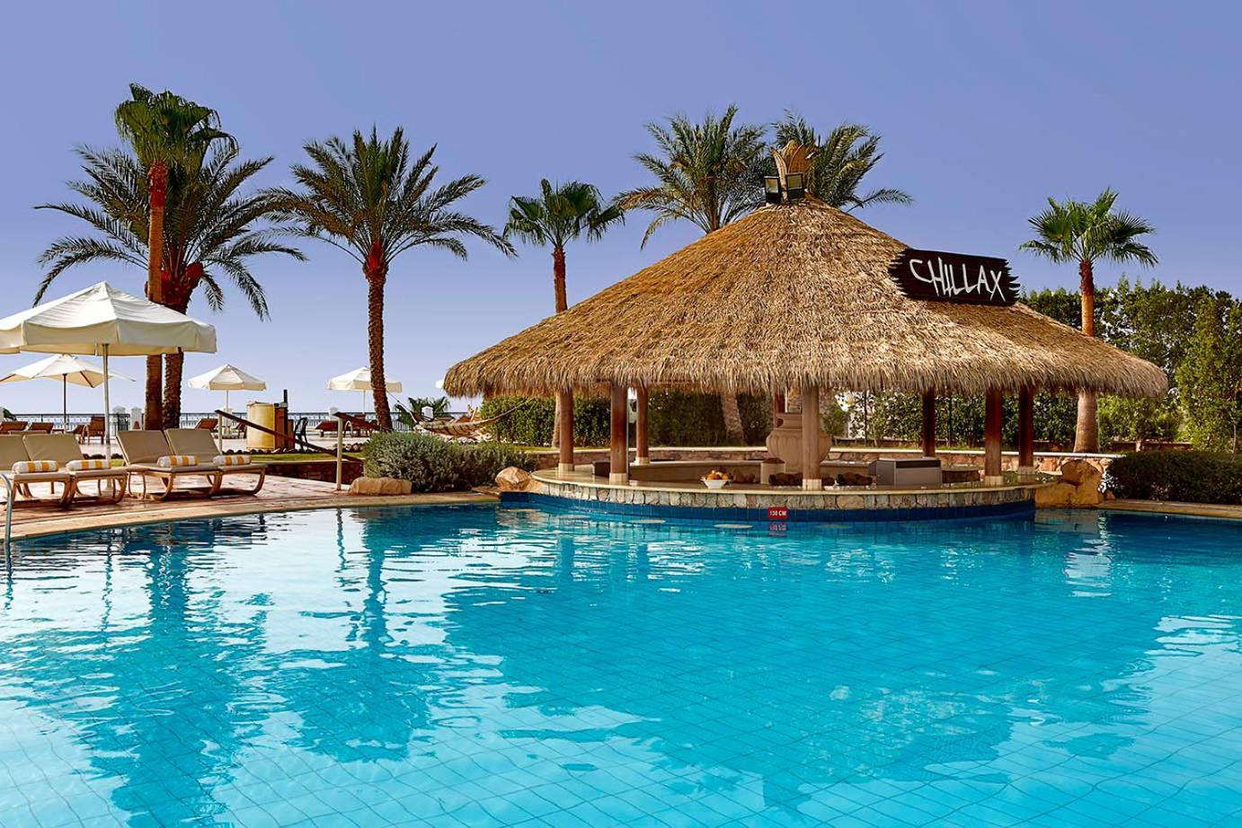 Safir Sharm Waterfalls Resort Exterior photo The pool at the Hilton Sharm El Sheikh